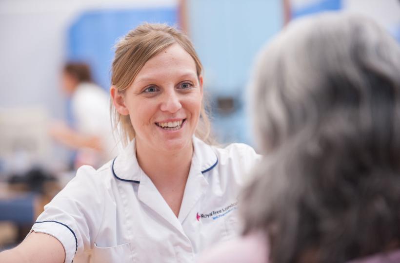 a physio talking to a patient a physio talking to a patient