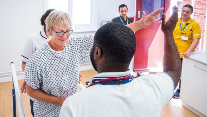 FL Sept 25 Campaign, collaborate, celebrate Physio Dickson Adom with patient